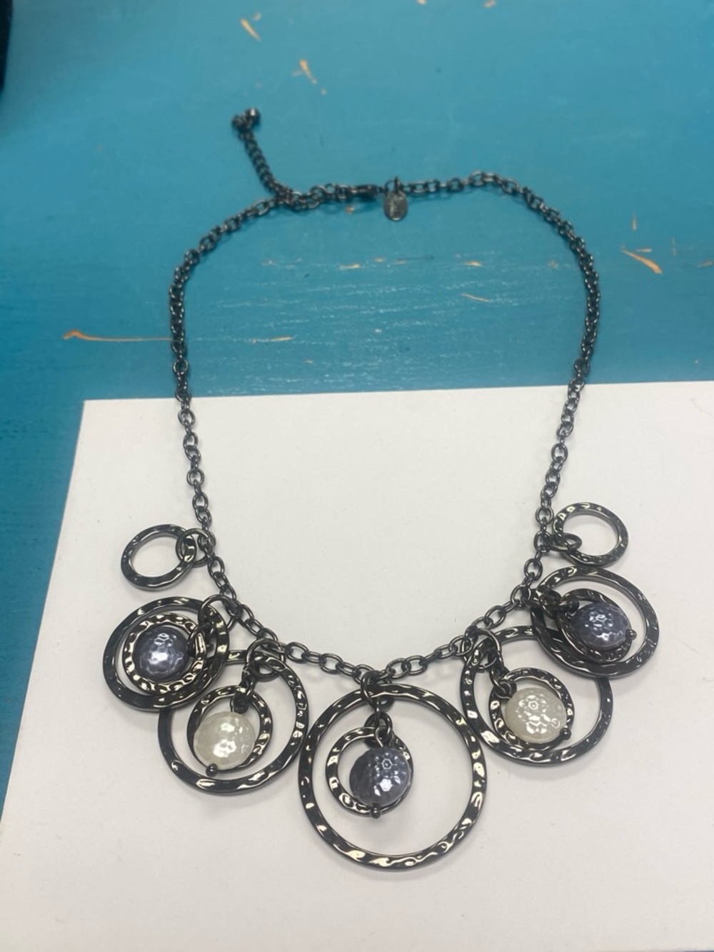 Lia Sophia Gunmetal Circle Pendant Statement Necklace with faux pearl accents